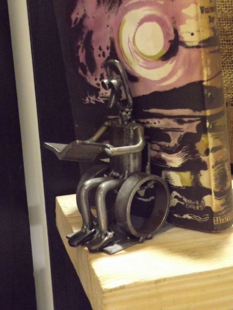 Wheelchair bookend. A wide range of figures is available.: Swipe To View More Images