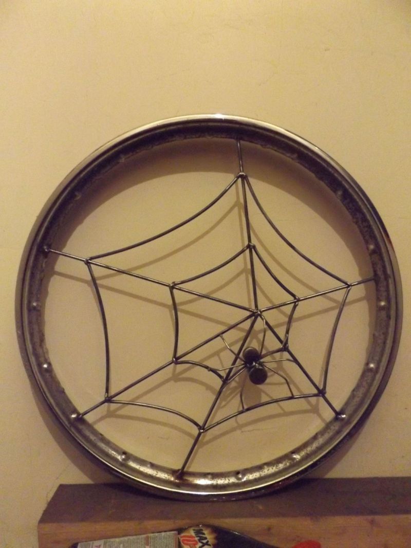 Recycled motorcycle wheel rim with recycled clothes dryer: Swipe To View More Images