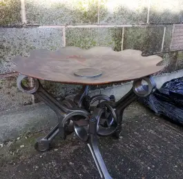 Fire dish. Worn harrow blade and marine engine pistons: Click Here To View Larger Image