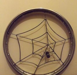 Recycled motorcycle wheel rim with recycled clothes dryer: Click Here To View Larger Image